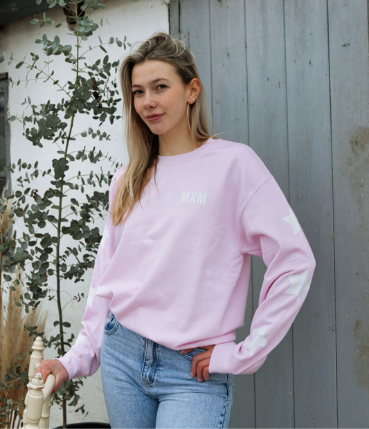 De roze noor sweater met witte sterren