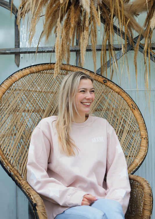 De Oud Roze Noor Sweater Met Witte Sterren